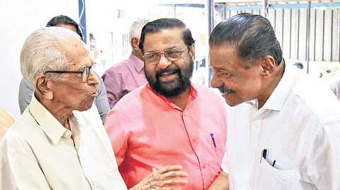 CPM state secretary M V Govindan greets literary critic and writer M K Sanoo at the Ernakulam Public Library on Saturday