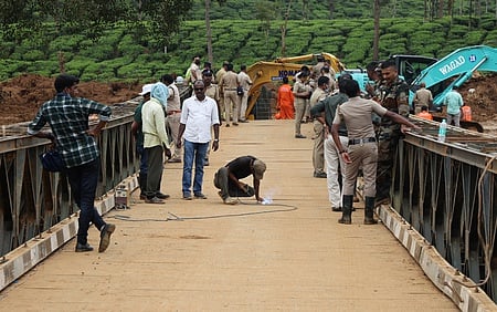Army men repairing the new Bailey bridge built at the landslide-hit Chooralmala in Wayanad on Monday.