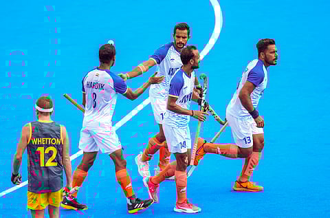 India's captain Harmanpreet Singh (13) celebrates with teammates after scoring a goal (Photo | PTI)
