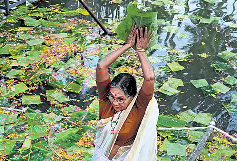 A woman performs Karkkidaka Vavubali rituals at Thiruvallam Parasurama temple on Saturday