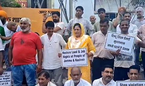 The protesters were carrying placards and chanted slogans in support of the restoration of statehood, land and job rights and holding of the assembly elections.