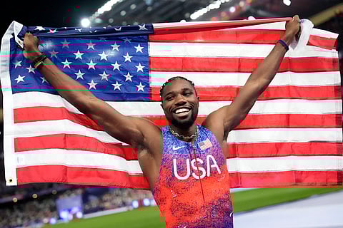 Noah Lyles, of the United States, celebrates after winning the men's 100-meters final at the 2024 Summer Olympics on Aug. 4, 2024, in Saint-Denis, France.