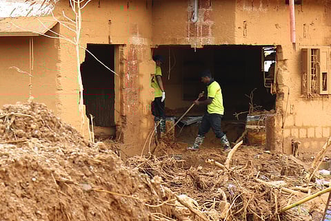 Volunteers carrying out searches at Chooralmala on the sixth day of the massive landslide in the area