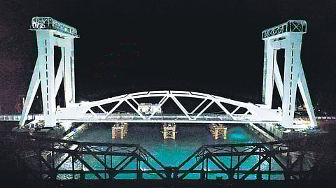 Railways department carrying out trial run on Pamban bridge on Sunday.