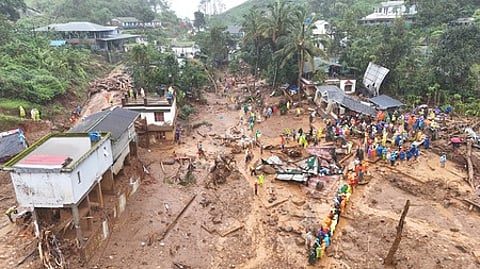 Rescue team busy engaged in the rescue operation at the spot where landslide occured at Chooralmala in Wayanad district.