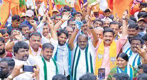 JDS leader and Union Minister for Steel and Heavy Industries HD Kumaraswamy, state JDS youth wing president Nikhil Kumaraswamy, state BJP chief BY Vijayendra and others at the NDA padayatra in Ramanagara on Monday | express