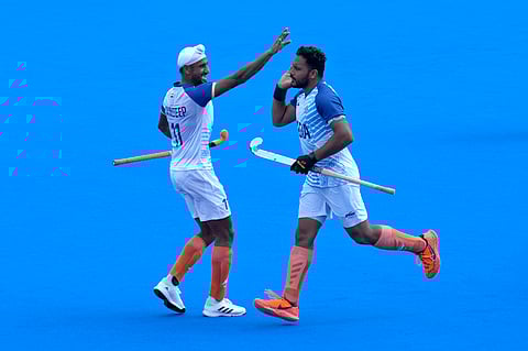 Skipper Harmanpreet Singh (right) played a key role in India's victory