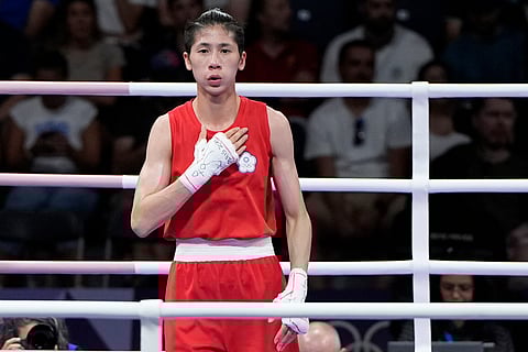 Taiwan's Lin Yu-ting reacts after defeating Uzbekistan's Sitora Turdibekova in their women's 57 kg preliminary boxing match at the 2024 Summer Olympics, Friday, Aug. 2, 2024, in Paris, France.