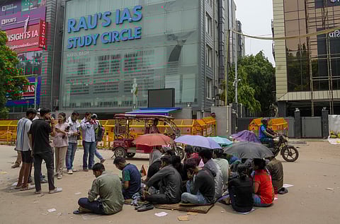 Students stage a protest after three civil services aspirants died due to drowning at a coaching centre in Old Rajinder Nagar area, in New Delhi, Wednesday, July 31, 2024.