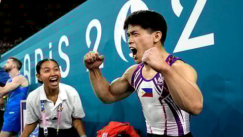 Carlos Edriel Yulo, of the Philippines, celebrates after competing during the men's artistic gymnastics individual floor finals at Bercy Arena at the 2024 Summer Olympics.