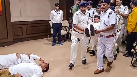 Marshals bring Jharkhand BJP MLAs out of the Jharkhand Legislative Assembly during their protest amid the ongoing Monsoon session, in Ranchi, Wednesday, July 31, 2024