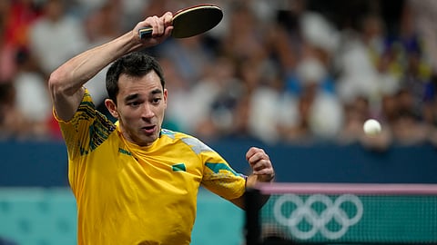 Brazil's Hugo Calderano plays against France's Alexis Lebrun during a men's singles round of 16 table tennis game at the 2024 Summer Olympics, Wednesday, July 31, 2024, in Paris, France.