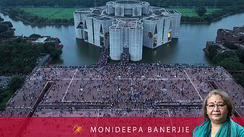 Protesters celebrate at the Parliament House premise after news of Prime Minister Sheikh Hasina's resignation, in Dhaka, Bangladesh, Monday, Aug. 5, 2024.