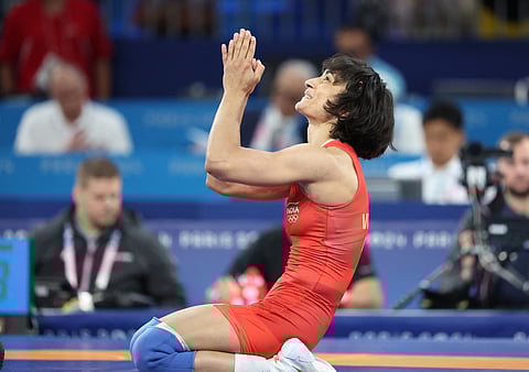 Vinesh Phogat reacts after her semifinal bout at the Paris Olympics
