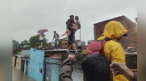 State Disaster Response Force (SDRF) officials rescue those trapped due to flash floods in Kumaon.