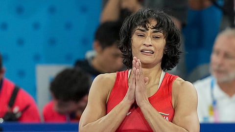 Wrestler Vinesh Phogat celebrates after winning her Women's Freestyle 50kg semi-final wrestling match against Cuba's Yusneylys Guzman Lopez at the 2024 Summer Olympics, in Paris, France, Tuesday, Aug. 6, 2024.