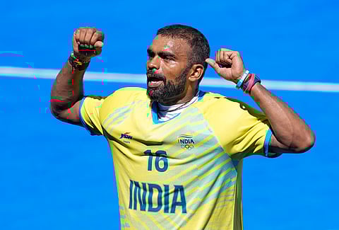 India's goalkeeper PR Sreejesh celebrates after India won the men's hockey bronze medal match against Spain at the 2024 Summer Olympics, in Colombes, France, Thursday, Aug. 8, 2024.