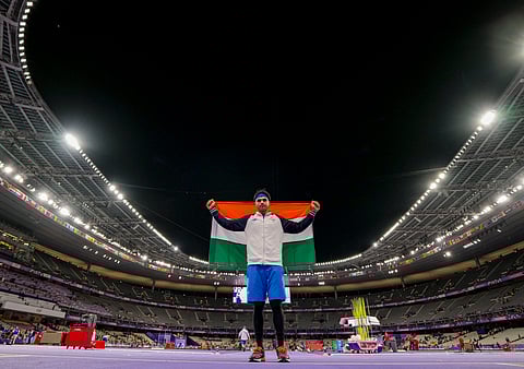 India's Neeraj Chopra celebrates after winning the silver medal in the men's javelin throw athletics event at the 2024 Summer Olympics, in Paris, France, Thursday, Aug. 8, 2024.