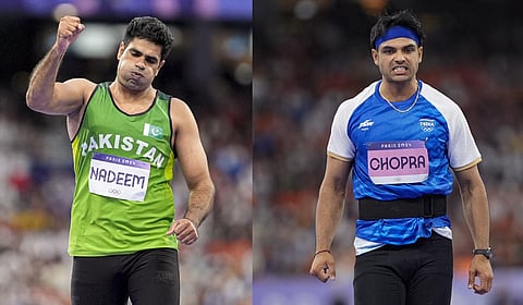 Silver medallist India's Neeraj Chopra and Gold medallist Pakistan's Arshad Nadeem celebrate after the men's javelin throw final