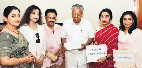 Rajkumar Sethupathi (owner of Kerala Strikers) and actors Suhasini Maniratnam, Khushbu Sundar, Meena Sagar and Lissy Lakshmi hand over a cheque of
C1 crore to Chief Minister Pinarayi Vijayan on Friday