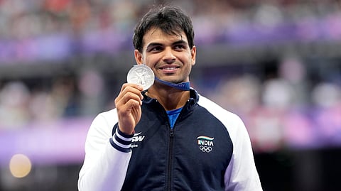 Men's javelin silver medalist, Neeraj Chopra on the podium at the 2024 Summer Olympics