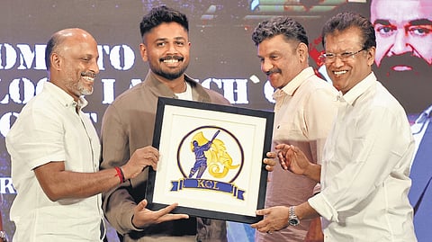 Cricketer Sanju Samson unveils the Kerala Cricket League (KCL) logo in Thiruvananthapuram on Friday. Kerala Cricket Association secretary Vinod S Kumar and president Jayesh George are also seen