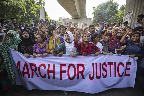 University students shout slogans during a protest to demand justice for the victims killed in the recent countrywide deadly clashes and ask for their campuses to be opened, in Dhaka, Bangladesh, July 31, 2024.