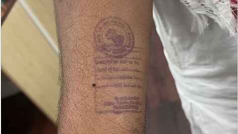 The stamp was put on his hand (by the jail authorities) when he was released from jail