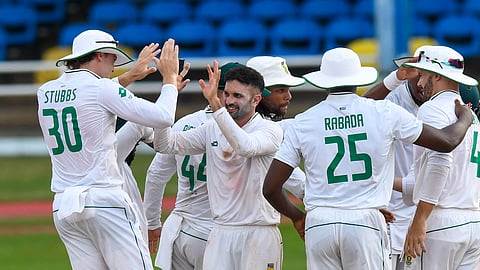 South Africa's Keshav Maharaj (2nd L) celebrates the dismissal of West Indies' Alick Athanaze during Day 3 of the 1st Test cricket match between West Indies and South Africa at Queens Park Oval, Port of Spain.