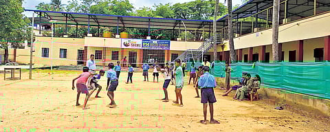 Students play and use the digital library at the Government Model Higher Primary School at KR Puram in Shivamogga.