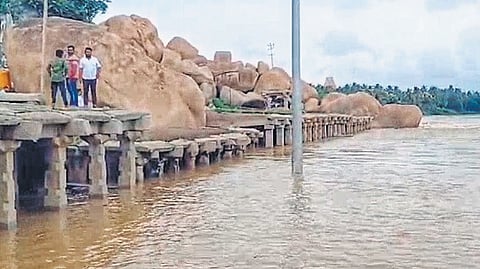 Monuments along the river stream in Hampi were submerged in flood waters on Sunday