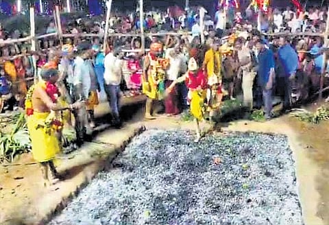 Videograb of the boy performing firewalk on Sunday night