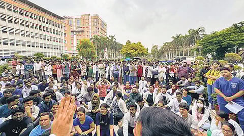 Medicos stage a protest against the sexual assault and murder of a postgraduate trainee doctor in Kolkata, at AIIMS, in New Delhi.