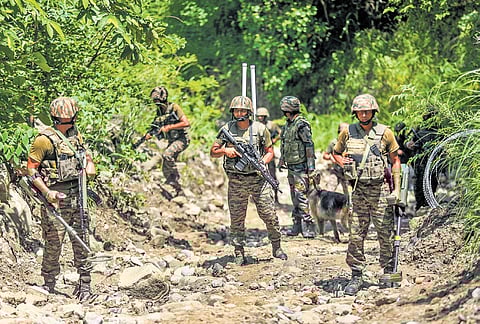 Soldiers during a security check near the Line of Control (LOC)