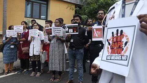Resident Doctors stage a protest against the sexual assault and murder of a postgraduate trainee doctor in Kolkata, at Jipmer in Puducherry on Tuesday.