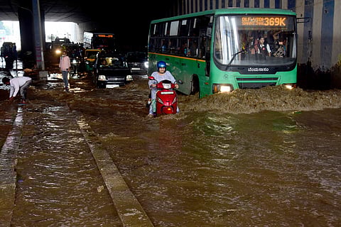 Water logged at an underpass near Jayadeva Hospital due to rain in Bengaluru on Monday.