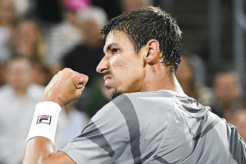 Australia’s, Alexei Popyrin, reacts following a shot to Andrey Rublev, of Russia, during the final of the National Bank Open men's tennis tournament in Montreal, Monday, Aug 12, 2024.