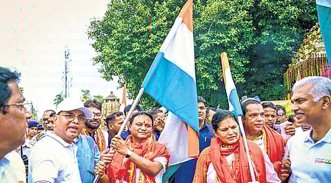CM Mohan Majhi waving the Tricolour at Old Town in Bhubaneswar on Wednesday. Also seen are Dy CM Pravati Parida,chief secretary Manoj Ahuja and BJP leaders