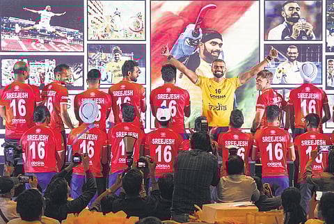PR Sreejesh with his teammates and staff during a felicitation ceremony on Wednesday. Hockey India decided to retire No 16 jersey in his honour