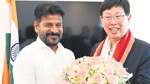 Chief Minister A Revanth Reddy with Foxconn chairman Young Liu in New Delhi on Friday
