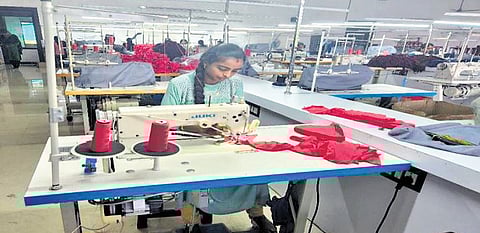 A worker at the apparel manufacturing unit at Palakkad Kinfra