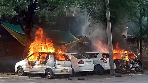 Flames out after vehicles were set on fire during violence erupted after a student was allegedly stabbed by his classmate at a government school, in the Rajasthan's Udaipur.