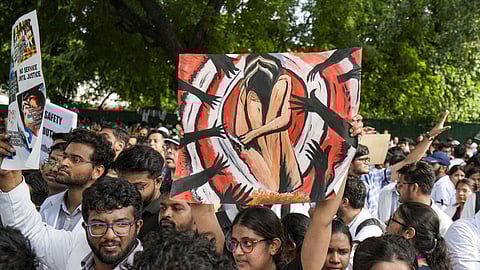 Members of Resident Doctors' Associations across Delhi stage a joint protest march against the alleged rape and murder of a woman