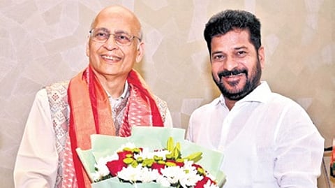 Congress Rajya Sabha candidate Abhishek Manu Singhvi with Chief Minister A Revanth Reddy in Hyderabad on Sunday