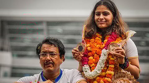 Markswoman Manu Bhaker with her personal coach Jaspal Rana.