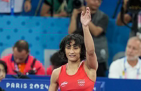 India's Vinesh Phogat celebrates after winning her Women's Freestyle 50kg semi-final wrestling match