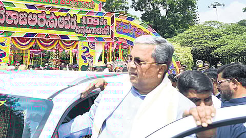Chief Minister Siddaramaiah leaves Vidhana Soudha after paying tribute to former chief minister Devaraj Urs on the latter’s birth anniversary on Tuesday