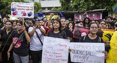 Youngsters take part in a protest against the alleged sexual assault and murder of a postgraduate trainee doctor, at Academy of Fine Arts, in Kolkata, Monday, Aug. 19, 2024.