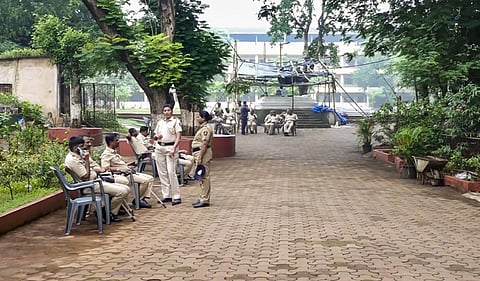 Police personnel deployed at the school in Badlapur a day after massive protests over alleged molestation