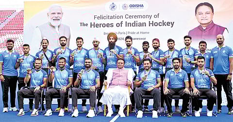 Chief Minister Mohan Charan Majhi with Indian hockey team during a felicitation ceremony at
Kalinga Stadium in Bhubaneswar on Wednesday
